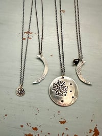 Image 9 of sterling silver moon pendant with brave inscription and green tourmaline