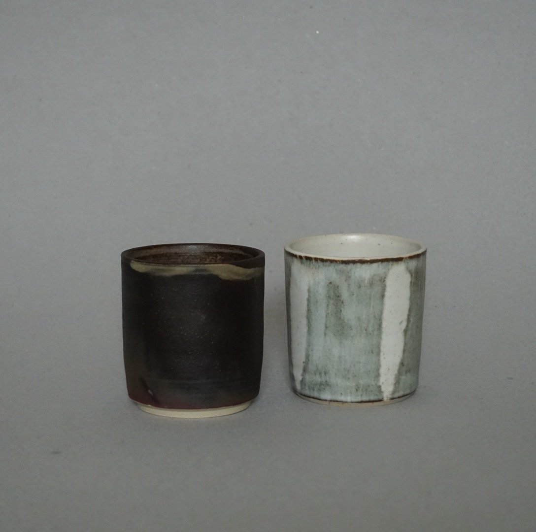 Image of Brown and White Cup
