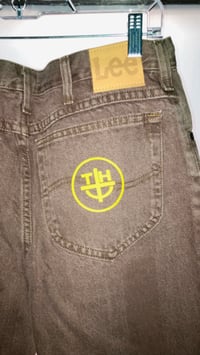 Image 5 of Split Leg Screw Cross Denim Jeans 