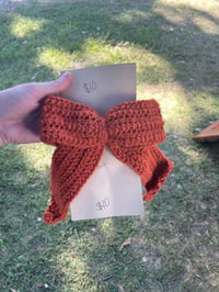 Burnt orange crocheted clip bow