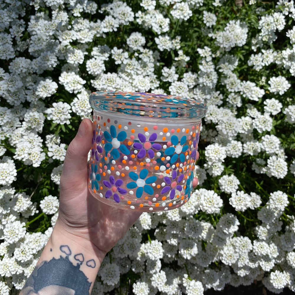 Image of flower bed stash jar