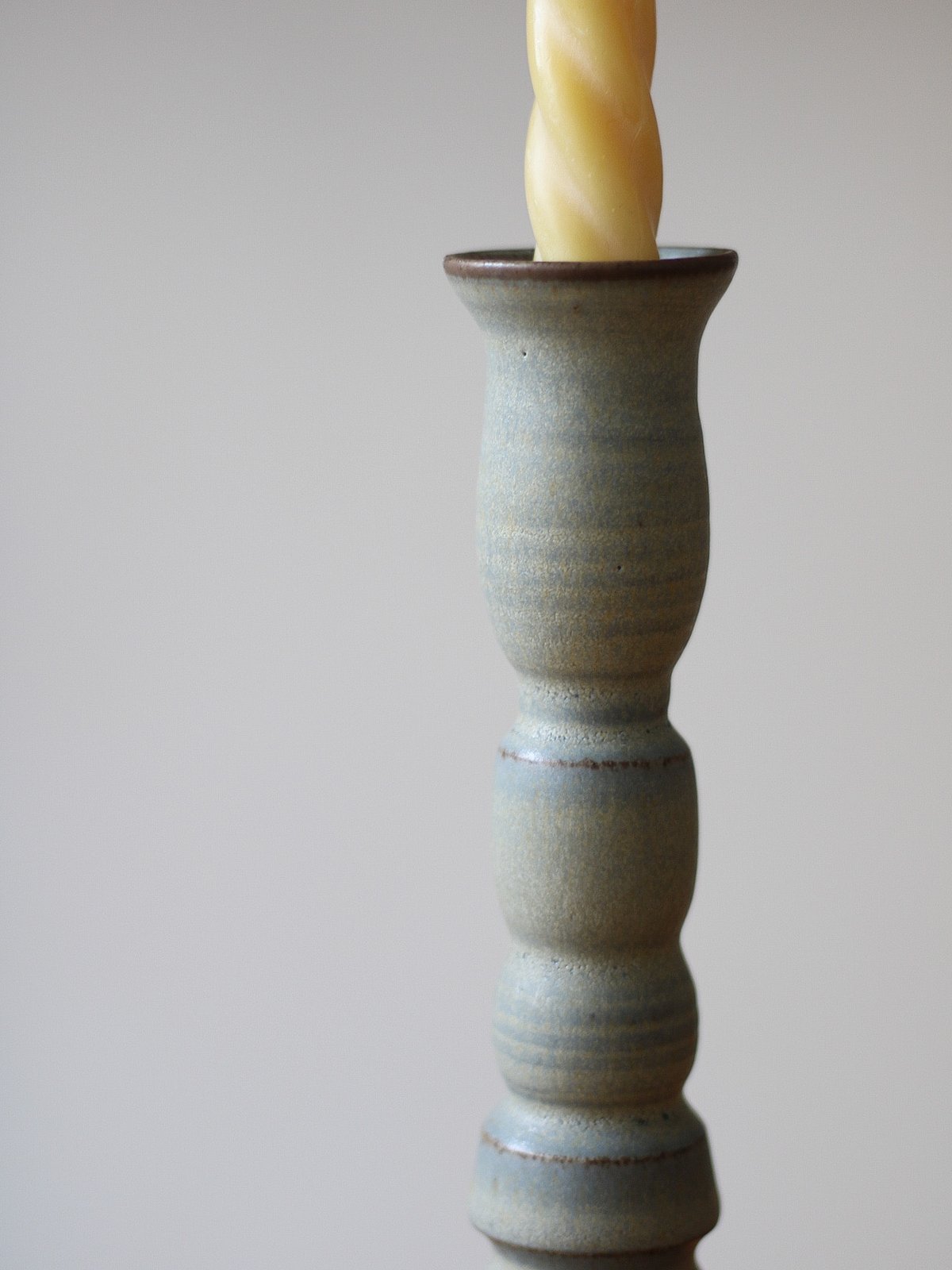 Image of long candle holder in loch