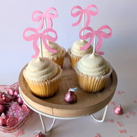 Image 2 of Moños Coquete Rosa Cupcake Toppers Sets de 12 y 24