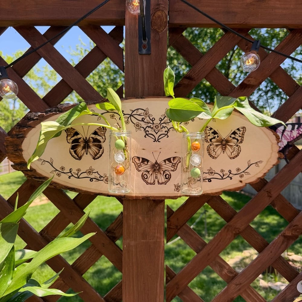 Image of trinity in the crest propagation wood art