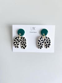 Paire de boucles d'oreilles céramique U TORNADA canard