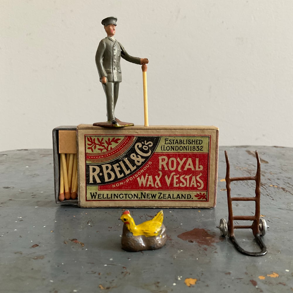 Image of Guy With Chook & Vesta Box