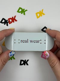 Image 1 of White real wear