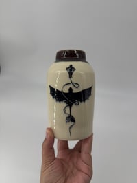 Image 1 of hiccup and toothless vase