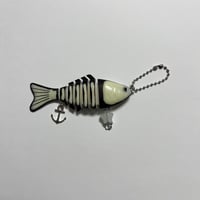 Image 2 of green glow in the dark skeleton fish keychain