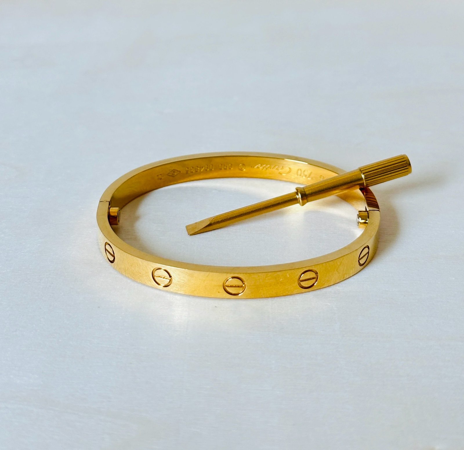 Preloved 18K saudi gold Cartier Love inspired double screw Bracelet Bangle,  Women's Fashion, Jewelry & Organizers, Bracelets on Carousell