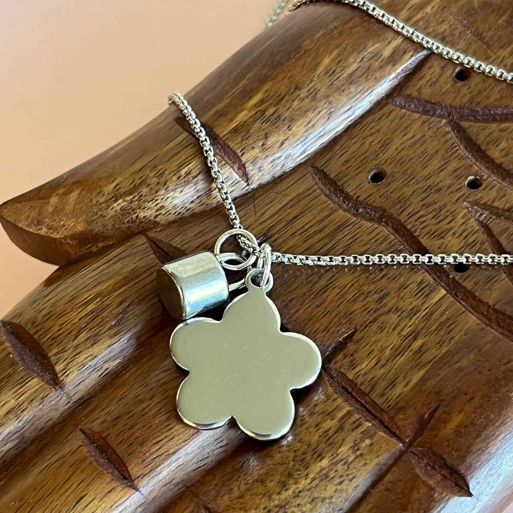 Image of Silver flower and barrel lock necklace