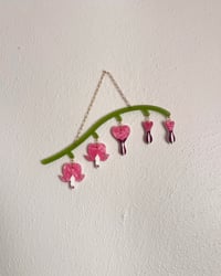 Image of bleeding hearts wall hanging
