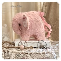 Image 6 of Handmade pink  teddy elephant on a little wooden cart.