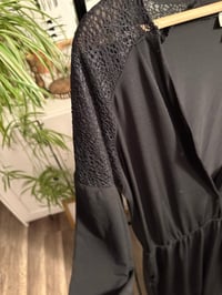 Image 3 of Black one piece jumper with lace 