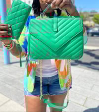 Green handbag with matching wallet