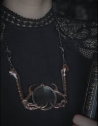Image 2 of Magnifying glass necklace with real corvid legs