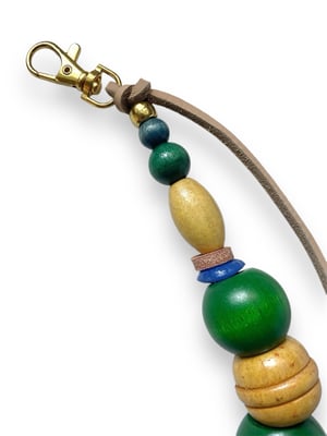 Image of GEMINI RISING BAG CHARM