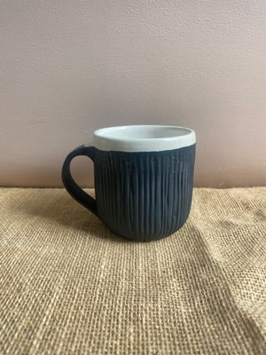 Image of carved mug black
