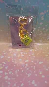 Green spellbound keychain