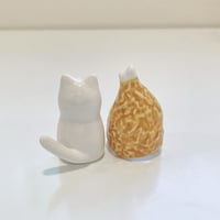 Image 6 of White cat with chicken drumstick ceramic figurine