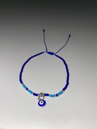 Image 1 of Dark blue/light blue evil eye bracelet