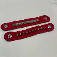 Image 1 of red bracelets 