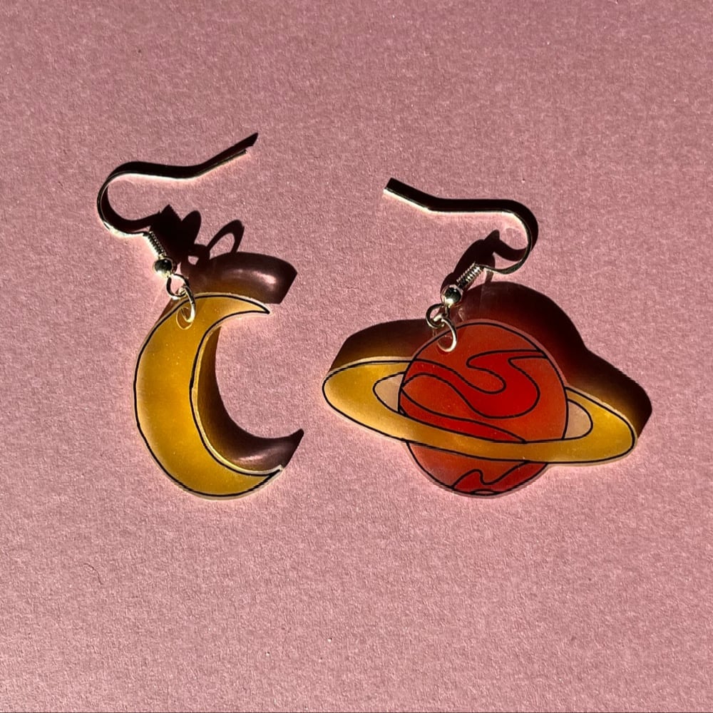 Image of moon and saturn earrings