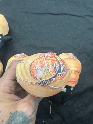 Image of Stuffed Happy toy