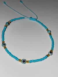 Image 2 of Teal multi evil eye bracelet 