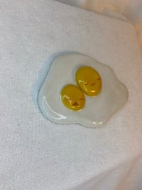 Image 3 of ‘Egg Twins’ utensil rest