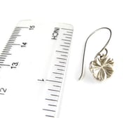 Image 4 of Tiny silver hibiscus earrings