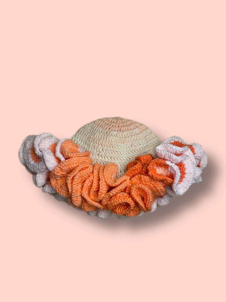 Image of pink orchid ruffled hat