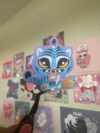 Image 1 of derpy tiger die cut sticker.