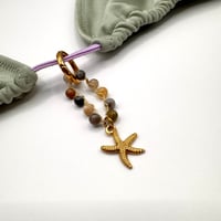 Image 2 of Fossilized Bamboo Starfish Bikini Charm