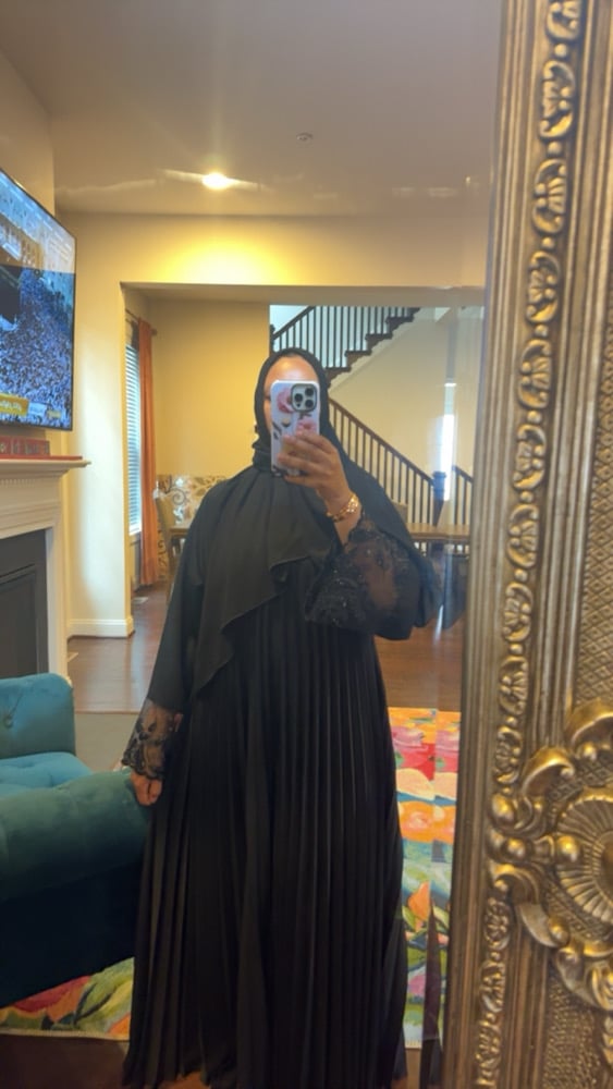 Image of Black Pleated Garment  