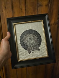 Image 1 of "ANTICHRIST" original print on a 1800's bible page with preserved spider web