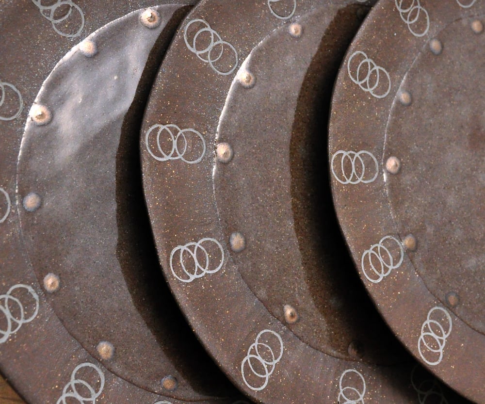 Image of riveted spring plates