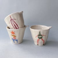 Image 1 of TASSE OREILLE