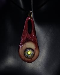 Image 5 of Optic Nerve-glow in the dark eye pendant with “eye shine” pupil