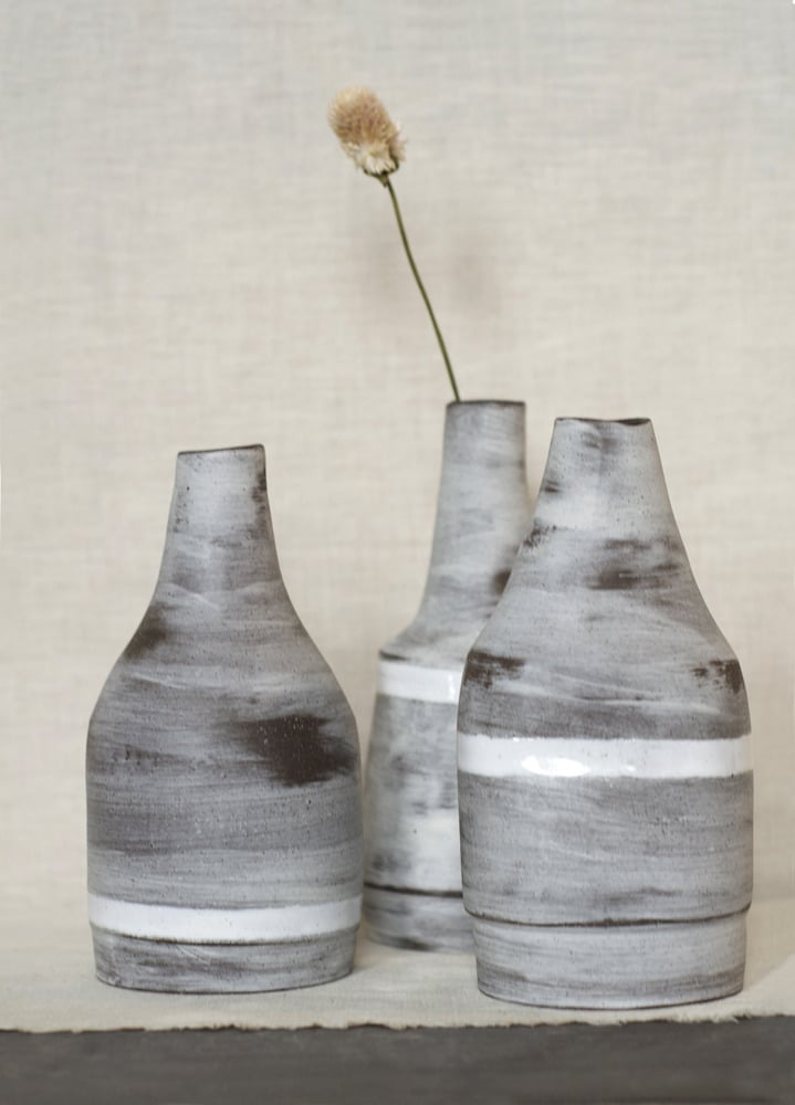 Image of roughed up bud vases