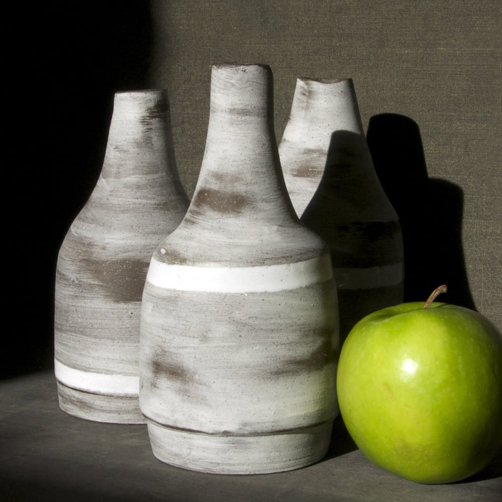 Image of roughed up bud vases