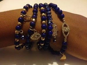 Image of Evil Eye charm stack