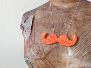Image of Knitted Orange Moustache Pendant on silver chain