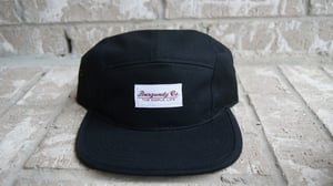 Image of black 5 panel cap