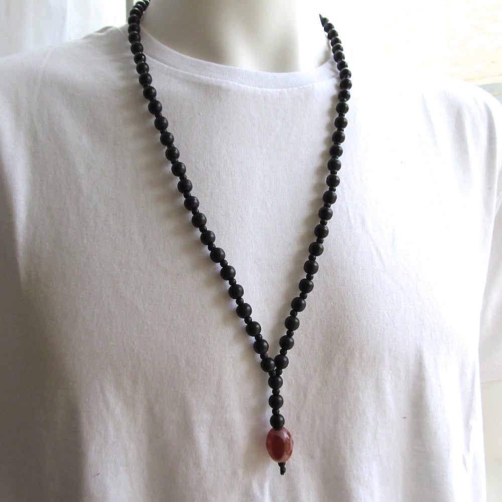 Image of Black Beaded Necklace With Decorative Glass Bead