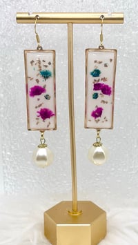 Image 2 of WHITE SPARKLY FLORAL DANGLES