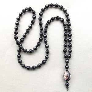 Image of Black Agate Beaded Necklace With Decorative Stone Bead