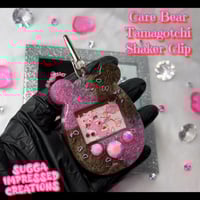 Image 1 of Love-A-Lot Care Bear Tamagotchi Shaker