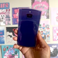 Image 2 of le sserafim fandom phone photocard holder.