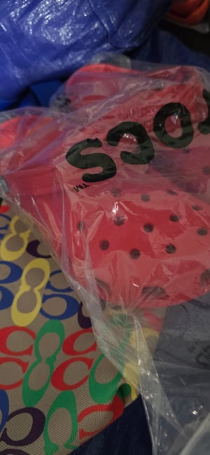 Image of Size 8 Colorful C Crocs with denim